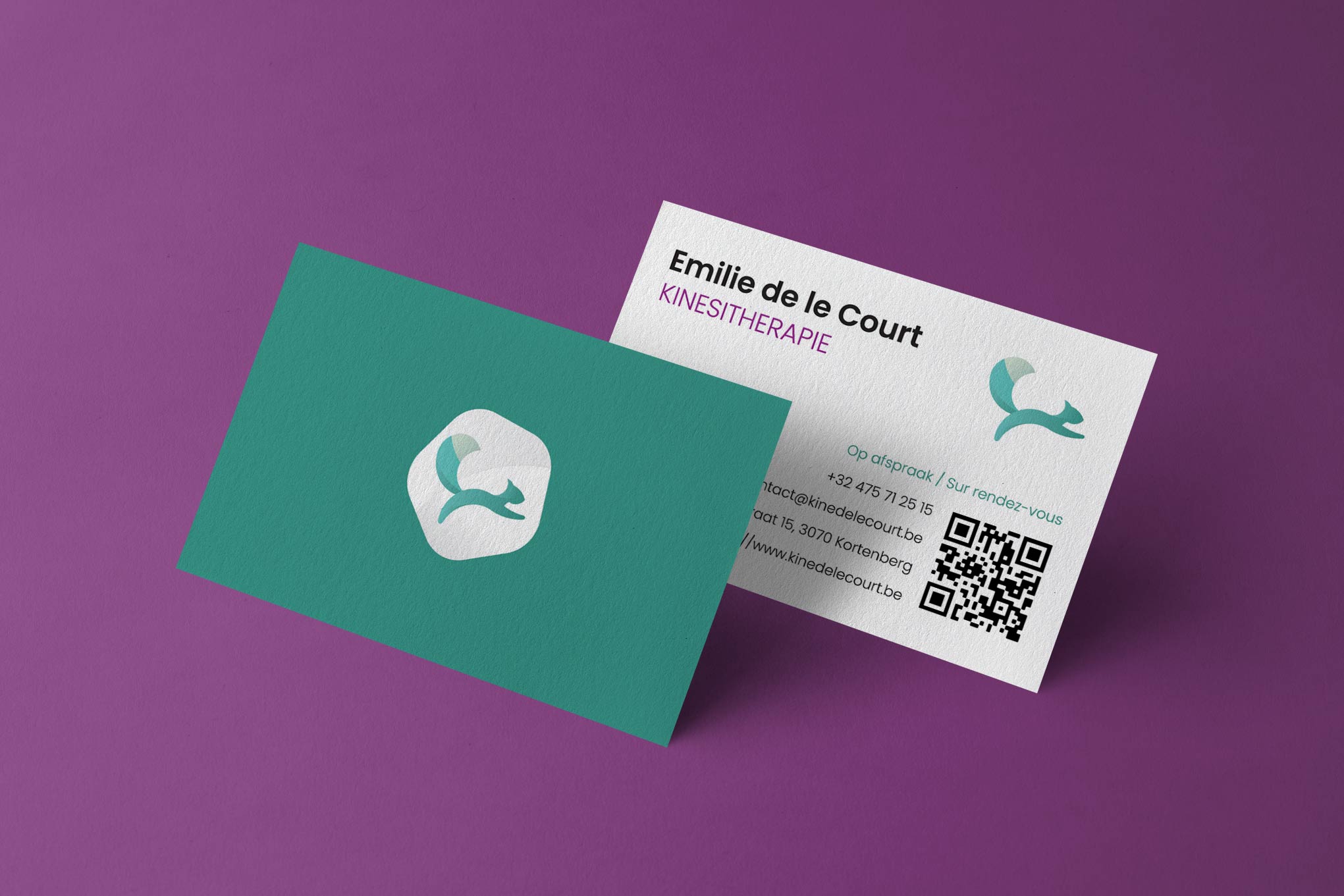 Green business cards on a purple background
